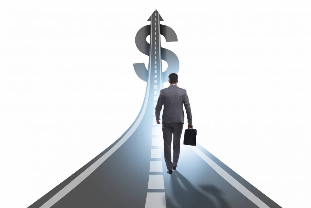 Businessman,On,The,Road,To,Wealth